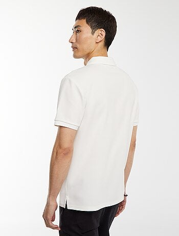 Polo a nido d'ape e collo con zip