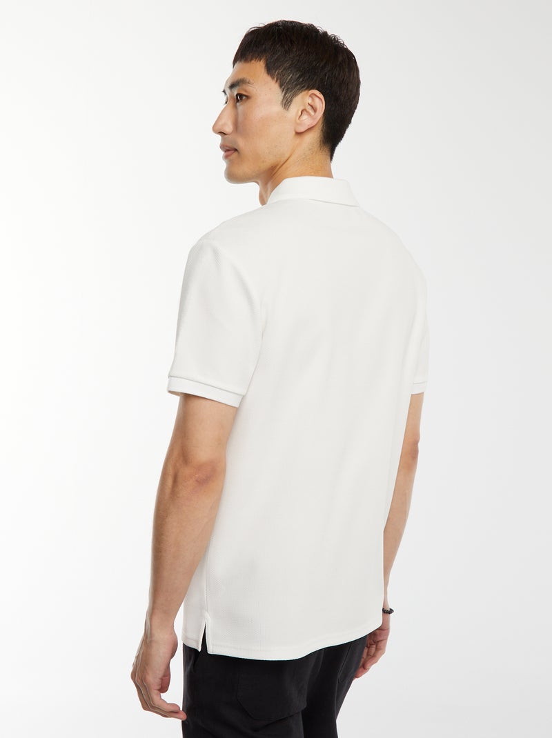 Polo a nido d'ape e collo con zip BIANCO - Kiabi
