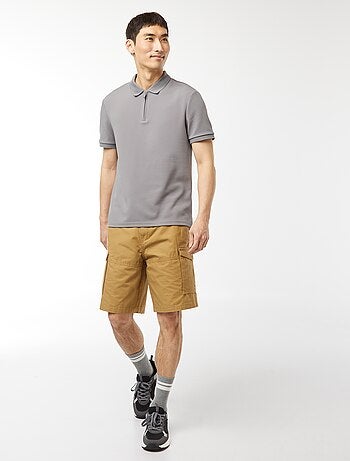 Polo a nido d'ape e collo con zip