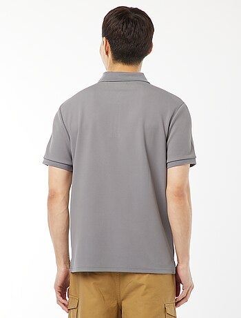 Polo a nido d'ape e collo con zip