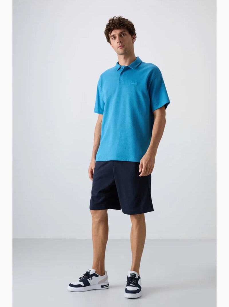 Polo ampio tommy Blu - Kiabi
