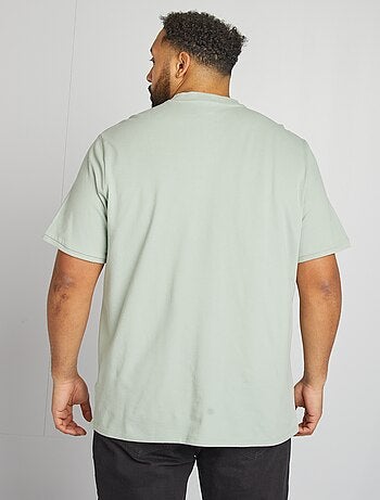Polo con collo serafino maniche corte