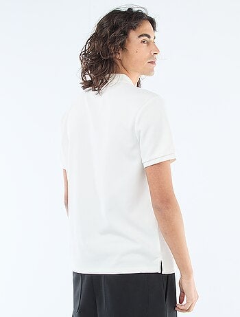 Polo con collo zippato