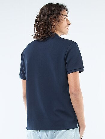 Polo con collo zippato