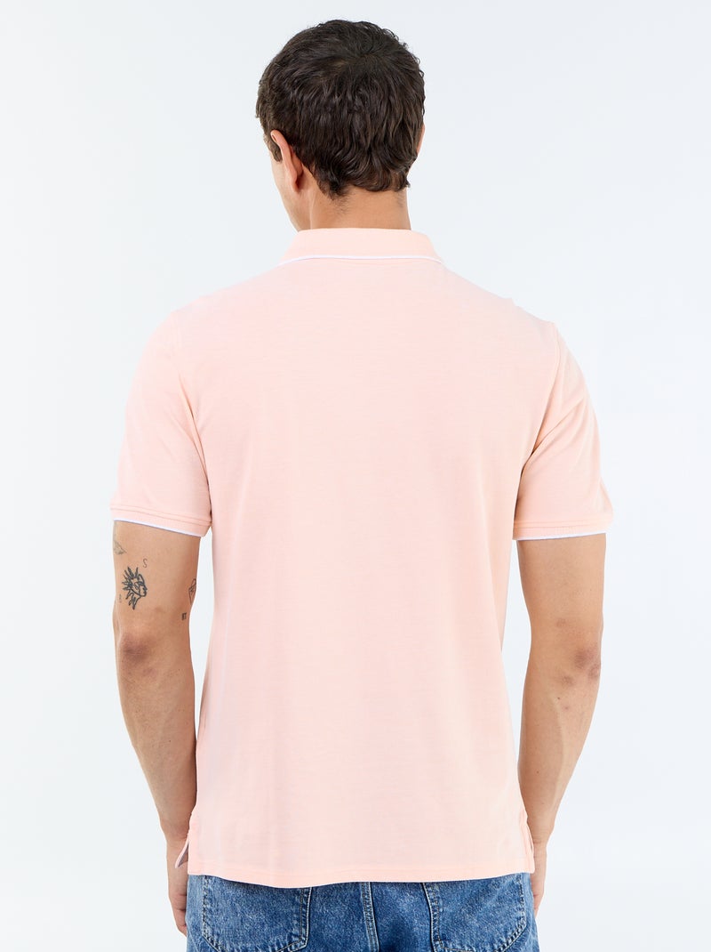 Polo con ricamo sul petto Arancione - Kiabi
