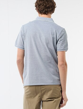 Polo con ricamo sul petto