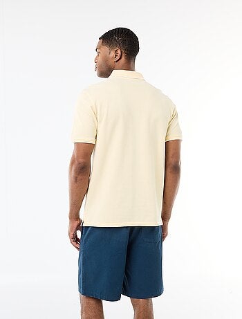 Polo con ricamo sul petto