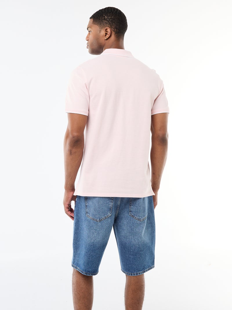 Polo con ricamo sul petto Rosa - Kiabi