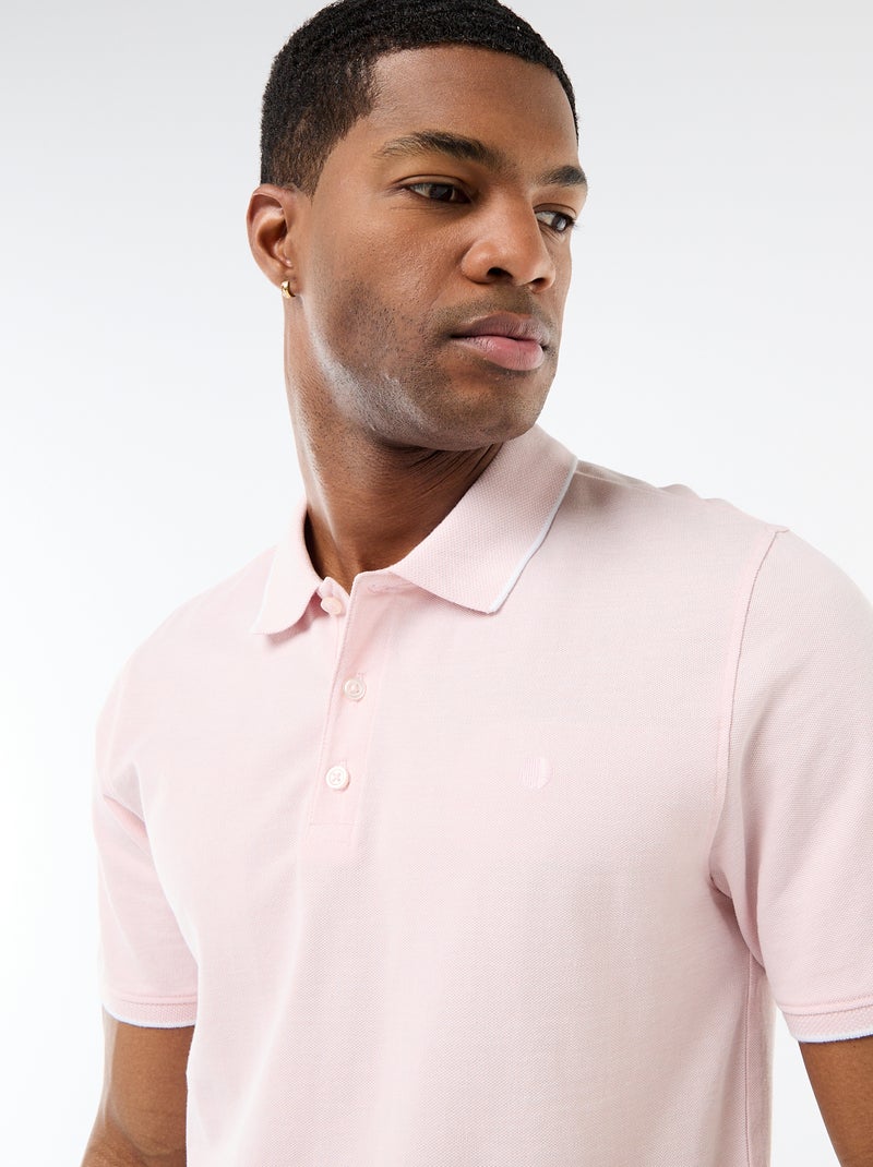 Polo con ricamo sul petto Rosa - Kiabi