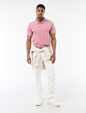 Polo con ricamo sul petto