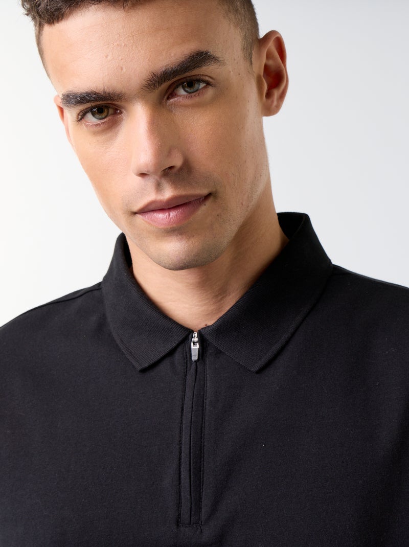Polo con zip Nero - Kiabi
