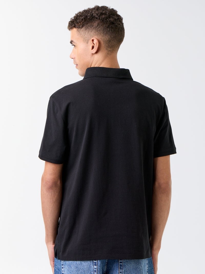 Polo con zip Nero - Kiabi