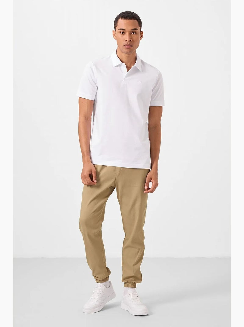 Polo cotone elastan tommy Bianco - Kiabi