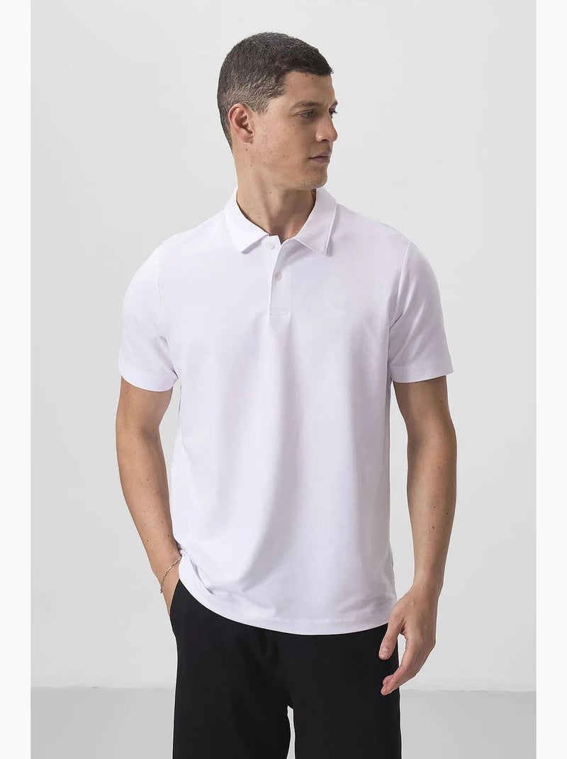 Polo cotone elastan tommy Bianco - Kiabi