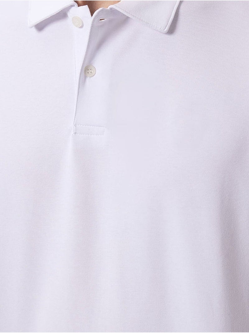 Polo cotone elastan tommy Bianco - Kiabi