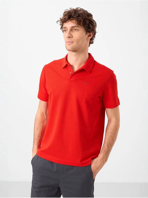 Polo cotone elastan tommy - Kiabi Polo cotone elastan tommy - Kiabi