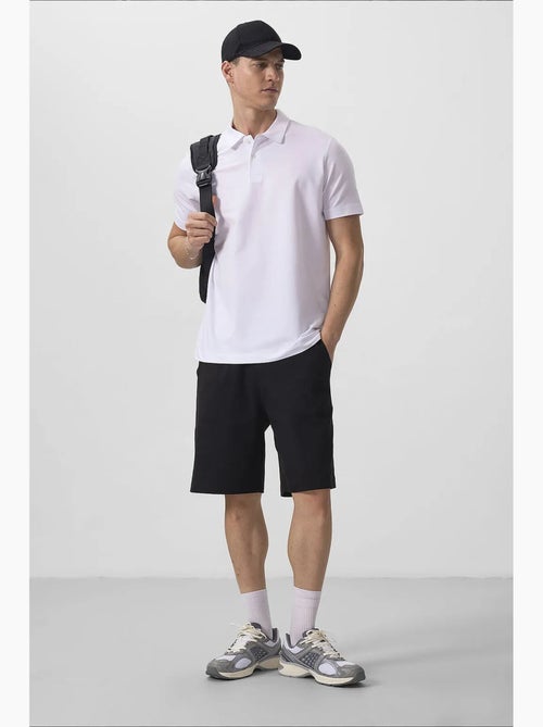 Polo da uomo in cotone ed elastan tommy - Kiabi Polo da uomo in cotone ed elastan tommy - Kiabi