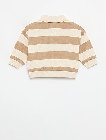 Polo 'Disney' in pile
