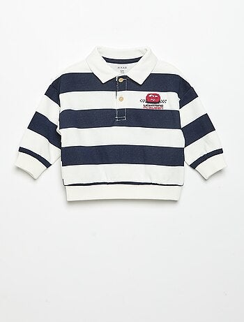 Polo 'Disney' in pile