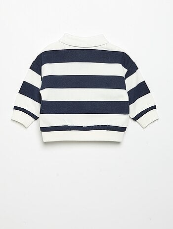 Polo 'Disney' in pile