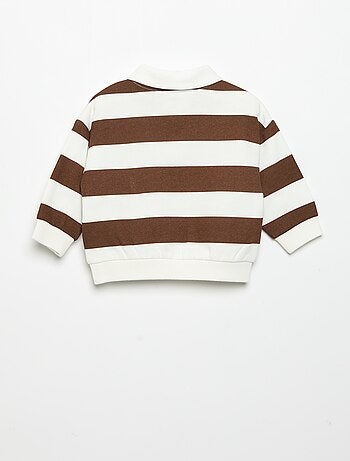 Polo 'Disney' in pile