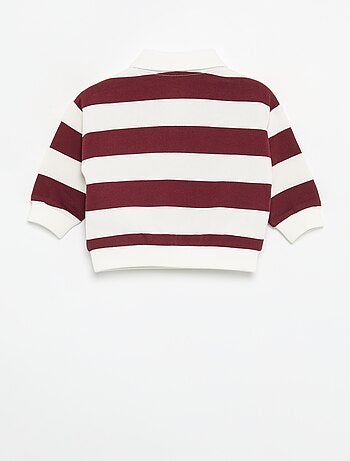 Polo 'Disney' in pile