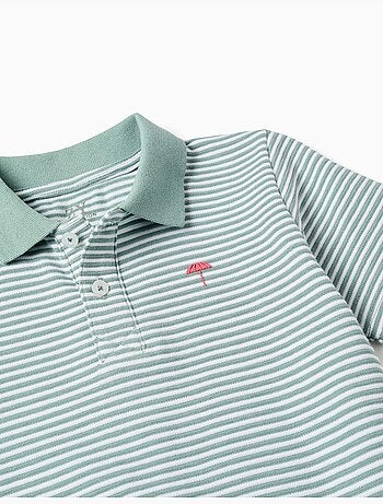 Polo in cotone a righe con stampa