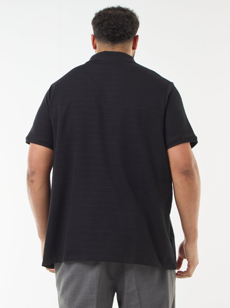 Polo in cotone stretch a maniche corte Nero - Kiabi