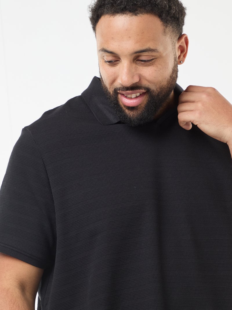 Polo in cotone stretch a maniche corte Nero - Kiabi