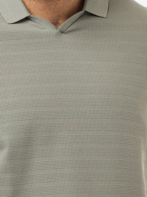 Polo in cotone stretch a maniche corte - Kiabi