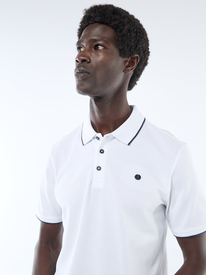 Polo in cotone tinta unita da uomo con colletto classico Bianco - Kiabi