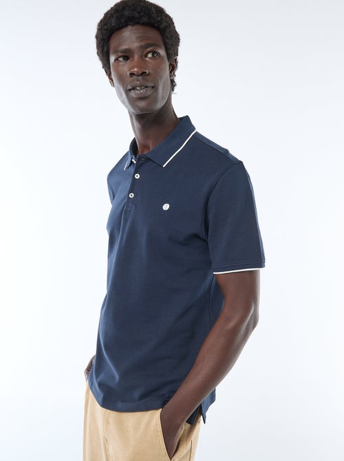 Polo in cotone tinta unita da uomo con colletto classico - Kiabi