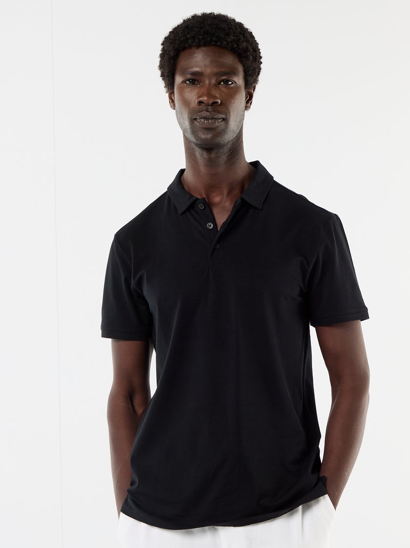 Polo in jersey con colletto abbottonato Nero - Kiabi
