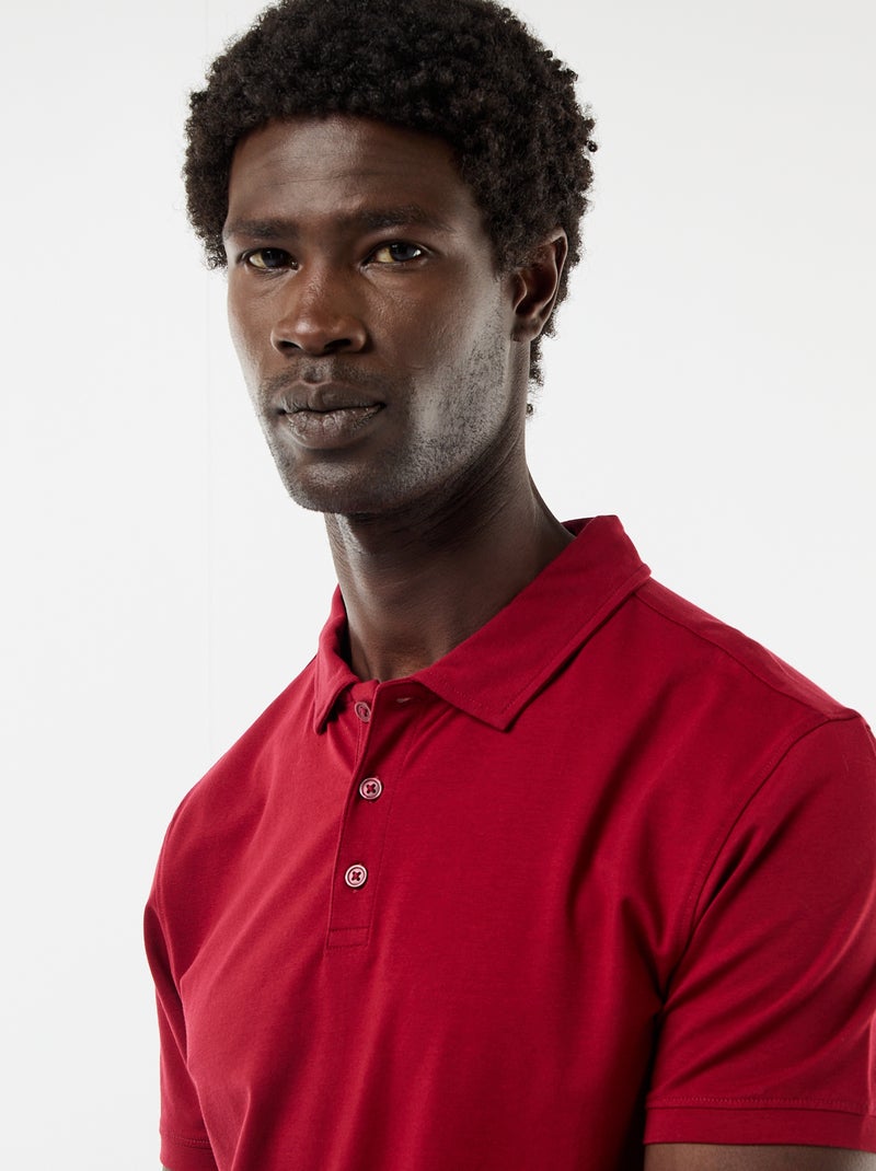 Polo in jersey con colletto abbottonato Rosso - Kiabi