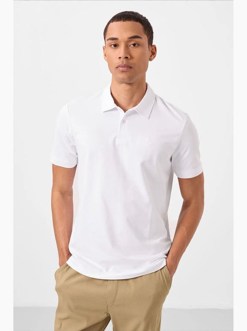 Polo in jersey di cotone misto da uomo tommy - Kiabi Polo in jersey di cotone misto da uomo tommy - Kiabi