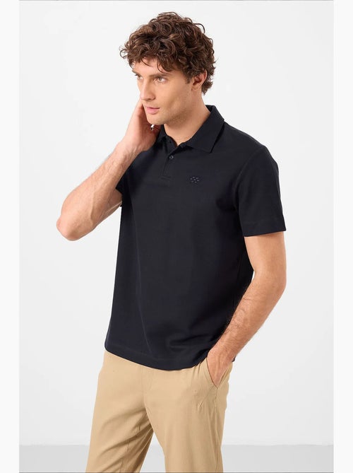 Polo in jersey di cotone misto da uomo tommy - Kiabi Polo in jersey di cotone misto da uomo tommy - Kiabi