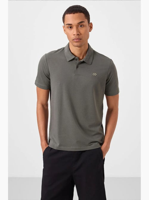 Polo in jersey di cotone misto da uomo tommy - Kiabi Polo in jersey di cotone misto da uomo tommy - Kiabi