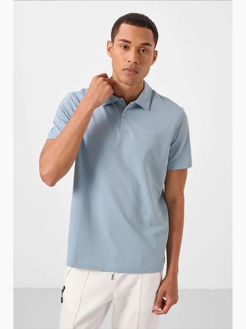 Polo in jersey di cotone misto da uomo tommy - Kiabi Polo in jersey di cotone misto da uomo tommy - Kiabi