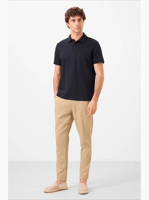 Polo in jersey di cotone misto da uomo tommy - Kiabi Polo in jersey di cotone misto da uomo tommy - Kiabi