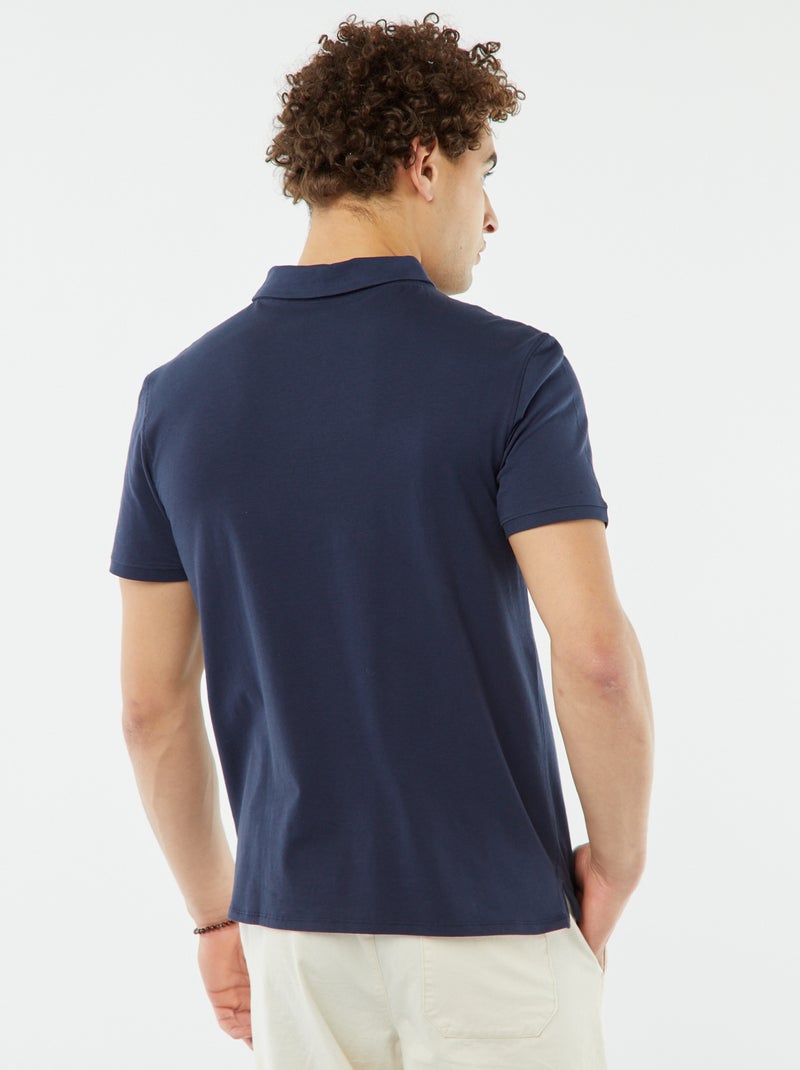 Polo in jersey tinta unita a maniche corte NERO - Kiabi