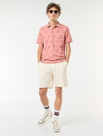 Polo in maglia piqué con motivo all over