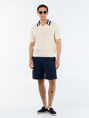 Polo in maglia traforata a maniche corte