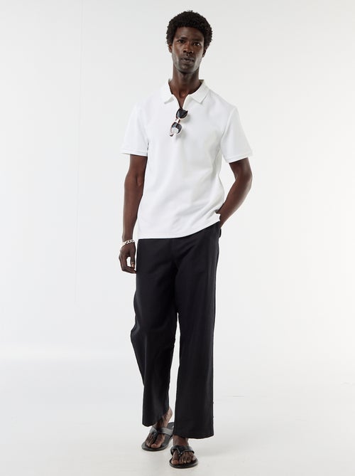 Polo in nido d'ape con collo con zip - Kiabi Polo in nido d'ape con collo con zip - Kiabi