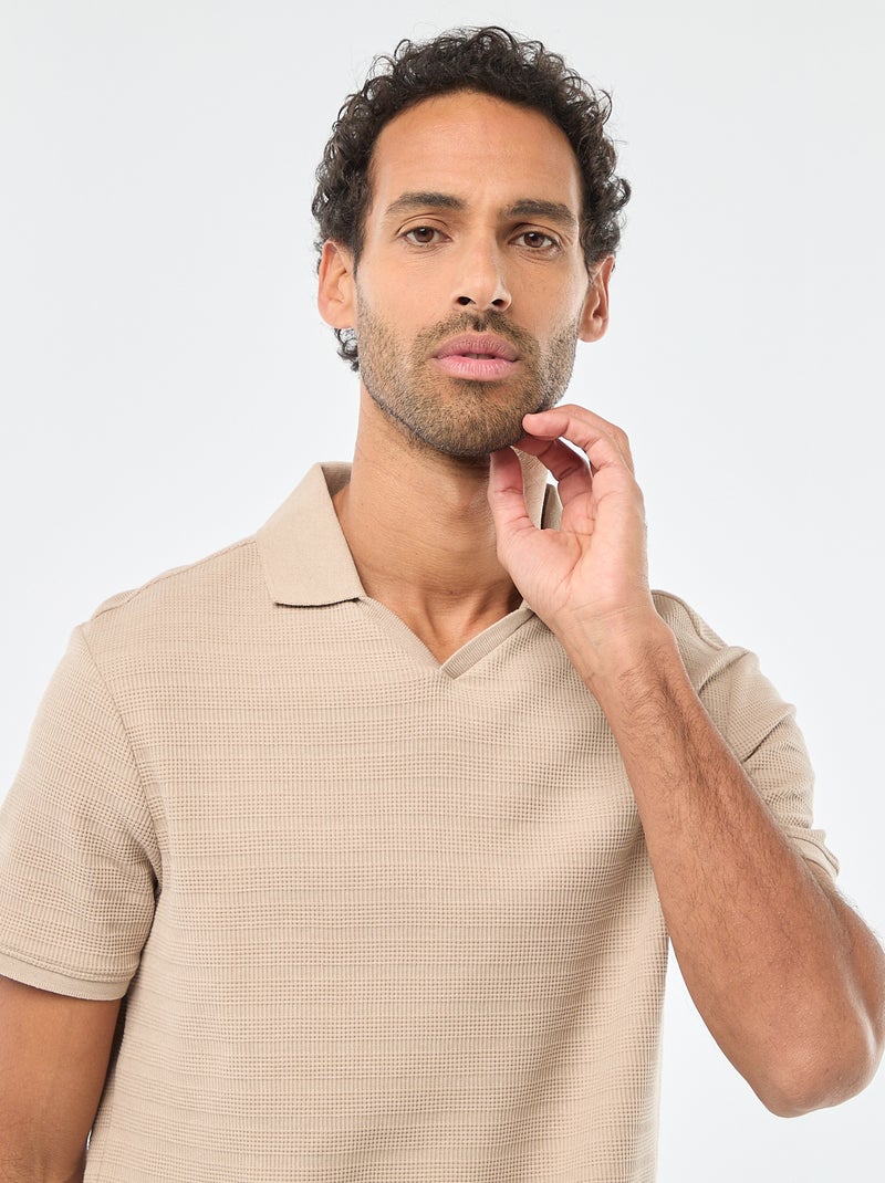 Polo in piqué di cotone a maniche corte Beige - Kiabi