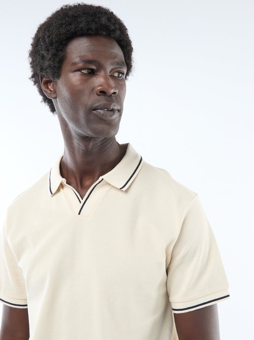 Polo in piqué di cotone a maniche corte - Kiabi Polo in piqué di cotone a maniche corte - Kiabi