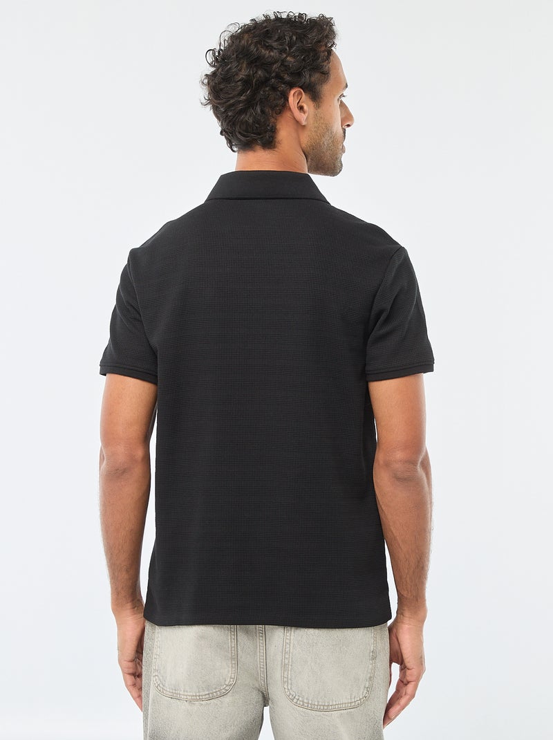 Polo in piqué di cotone a maniche corte Nero - Kiabi