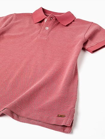 Polo in piqué di cotone con pois in jacquard