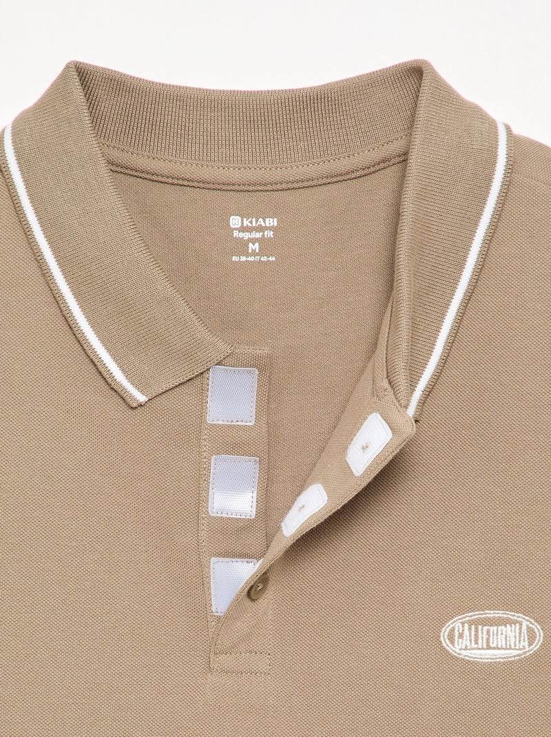 Polo in piqué di cotone con ricamo sul petto Beige - Kiabi