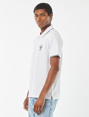 Polo in piqué di cotone con ricamo sul petto
