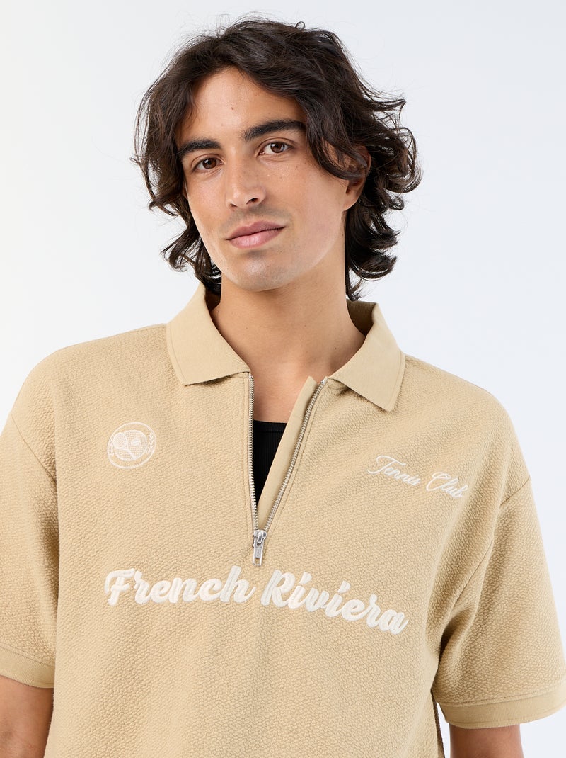 Polo in tessuto fantasia a maniche corte Beige - Kiabi